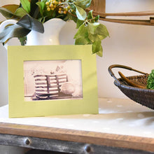 Load image into Gallery viewer, Lifestyle view of Green 5" x 7" Lizard Frame