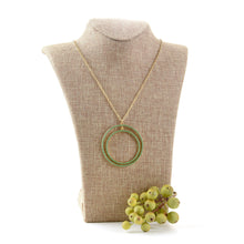 Load image into Gallery viewer, Lifestyle view of our Green Bead Circle Necklace