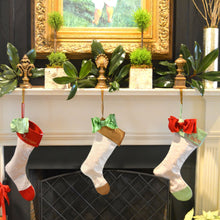 Load image into Gallery viewer, Lifestyle view of our Metallic Bow Gold Cuff Linen Stockings