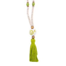 Load image into Gallery viewer, Natural wood bead necklace with lime tassel featuring a large ceramic bead in the center
