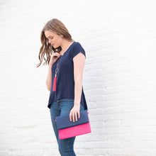 Load image into Gallery viewer, Lifestyle image of our Navy Fly Away Shirt