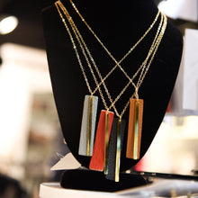 Load image into Gallery viewer, Lifestyle view of our Pebble Grain Accent Necklaces