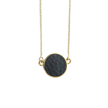 Load image into Gallery viewer, Top view of our Black Pebble Grain Circle Necklace