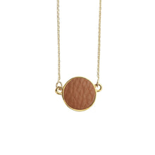 Load image into Gallery viewer, Top view of our Camel Pebble Grain Circle Necklace