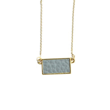 Load image into Gallery viewer, Top view of our Gray Pebble Grain Rectangle Necklace