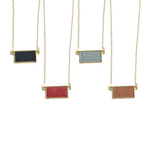 Load image into Gallery viewer, Top view of our Pebble Grain Rectangle Necklaces