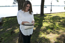 Load image into Gallery viewer, Lifestyle image of our Black Monogram Linen Ruffle Pouch