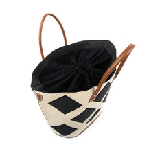 Load image into Gallery viewer, Top view of black diamond straw tote, showing the drawstring lining.