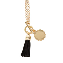 Load image into Gallery viewer, View of our Back Tassel Necklace with Scallop Disc