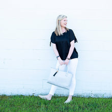 Load image into Gallery viewer, Lifestyle image of our Tie Sleeve Shirt