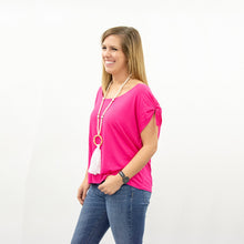 Load image into Gallery viewer, Lifestyle image of our Pink Tie Sleeve Shirt