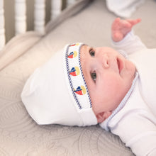Load image into Gallery viewer, Lifestyle view of our Navy Boat Smocked Beanie
