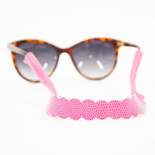 Load image into Gallery viewer, Lifestyle view of our Pink Lizard Scallop Sunglass Strap