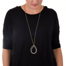 Load image into Gallery viewer, Lifestyle view of our Gray Bead Teardrop Necklace
