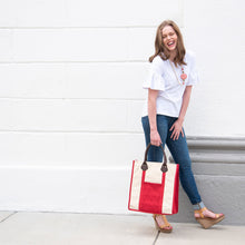 Load image into Gallery viewer, Lifestyle image of our Red Canvas Breyton tote
