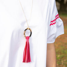 Load image into Gallery viewer, Lifestyle view of our Pink Blonde Tortoise Tassel Necklace
