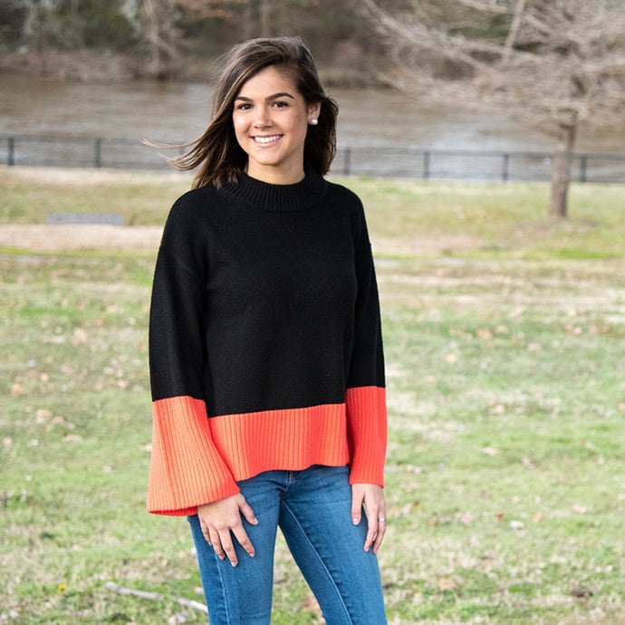 Lifestyle view of our Coral Color Block Sweater