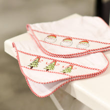 Load image into Gallery viewer, Lifestyle view of our Holiday Smocked Burp Cloths
