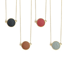 Load image into Gallery viewer, Top view of our Pebble Grain Circle Necklaces
