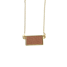 Load image into Gallery viewer, Top view of our Camel Pebble Grain Rectangle Necklace
