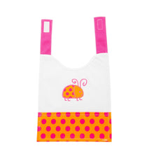 Load image into Gallery viewer, Front view of our Orange Ladybug Girl Vinyl Pocket Bib
